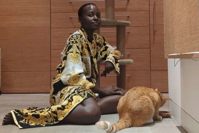 Nyong'o and Yoyo the cat