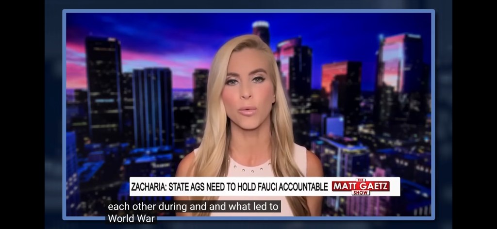 A female news commentator speaking on the Matt Gaetz Show, with a city skyline background at night.